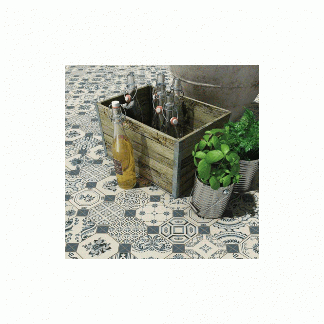 Plants and box on top of tiled kitchen floor
