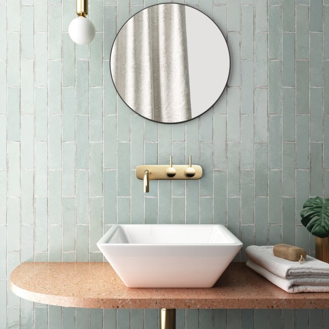 bathroom interior design with sink and blue tiles
